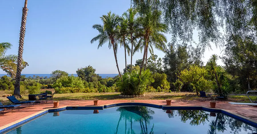 swimming pool with ocean view