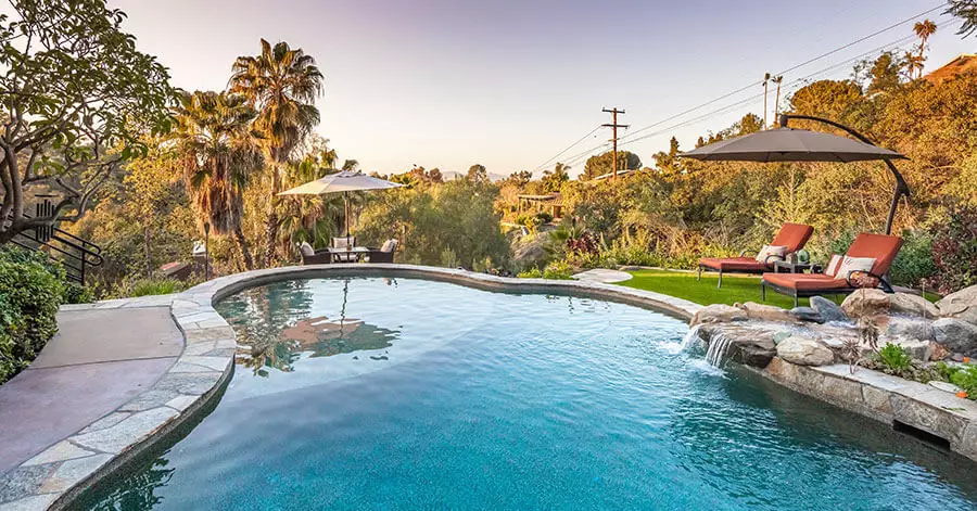 backyard swimming pool with view