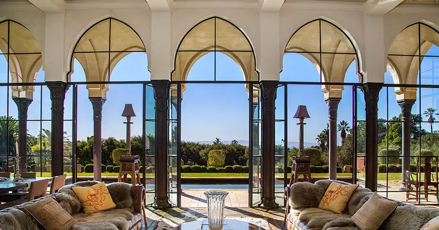 living room view of pool and mountains