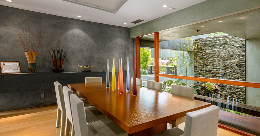 dining room and view of rock waterfall