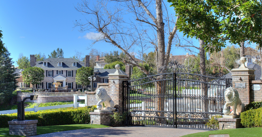 Exterior of luxury estate in Coto de Caza outside gated driveway 