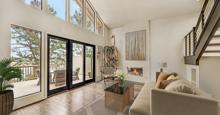 bright, large living room with high ceiling and lots of windows.