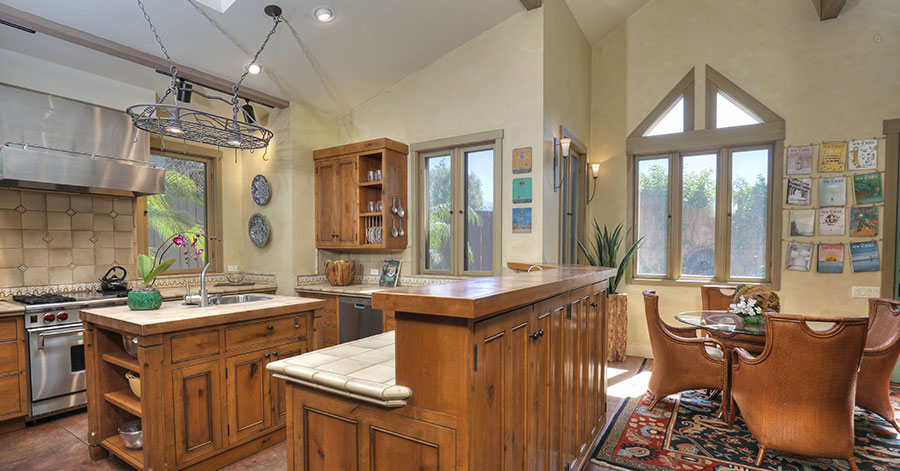 Gourmet kitchen with wooden cabinetry 