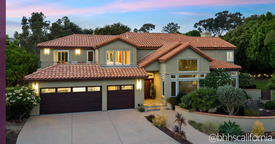 Exterior of home with great curb appeal, landscaping, and windows. 