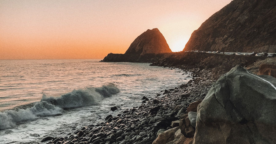 Sunset view of the rocky coastline at Point Mugu State Beach 