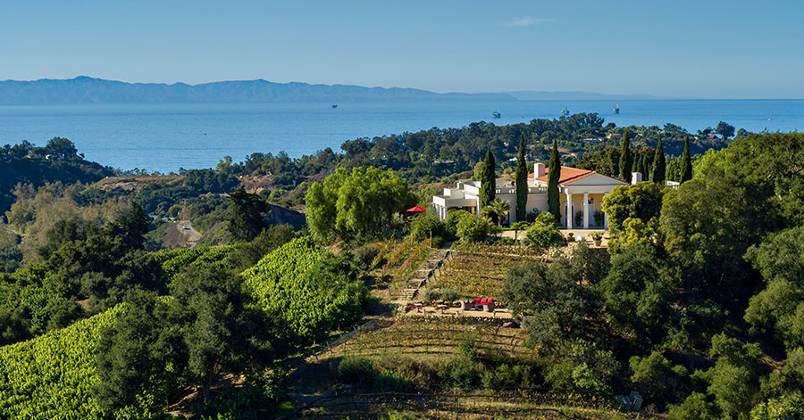 Aerial view of Santa Barbara estate and winery with ocean in the background