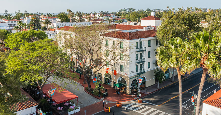 Aerial view of Santa Barbara hotel and busy streets below