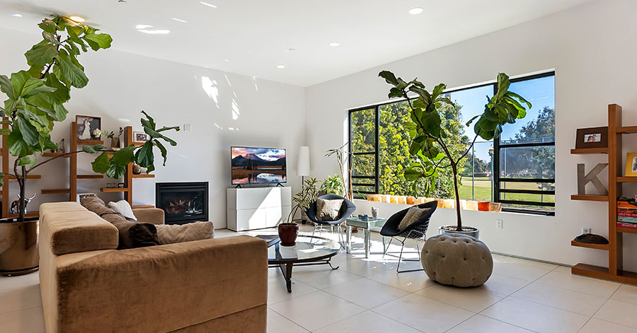 Living room with large picture window and bright natural light