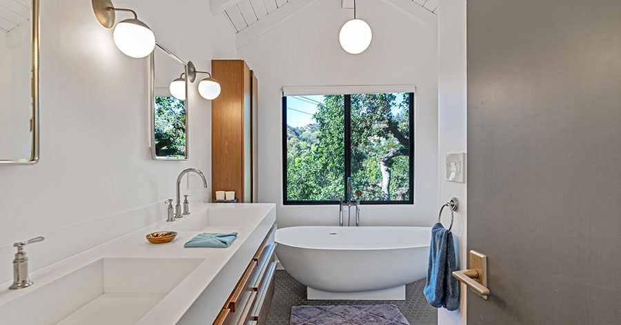 Modern bathroom at 360 Edwards Place with free standing bathtub 