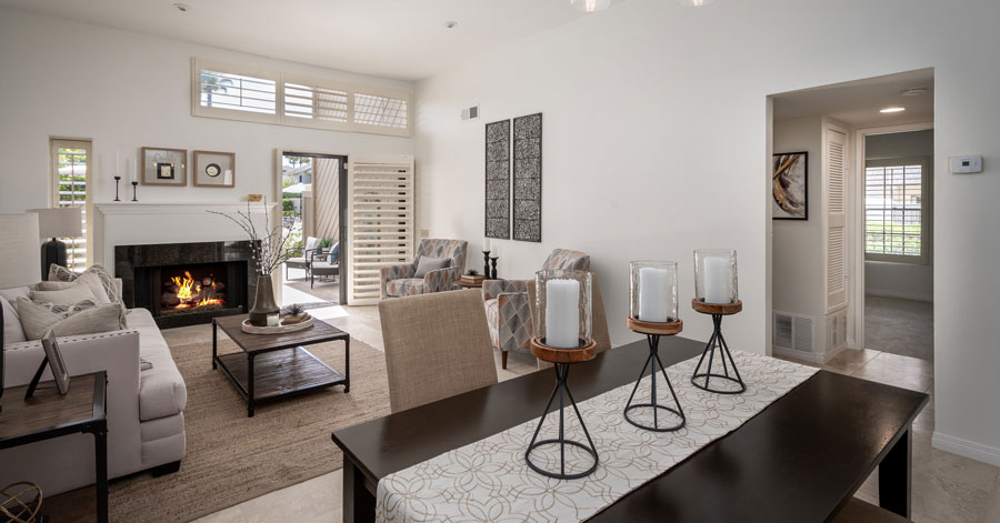 living room and dining room inside modern condominium 