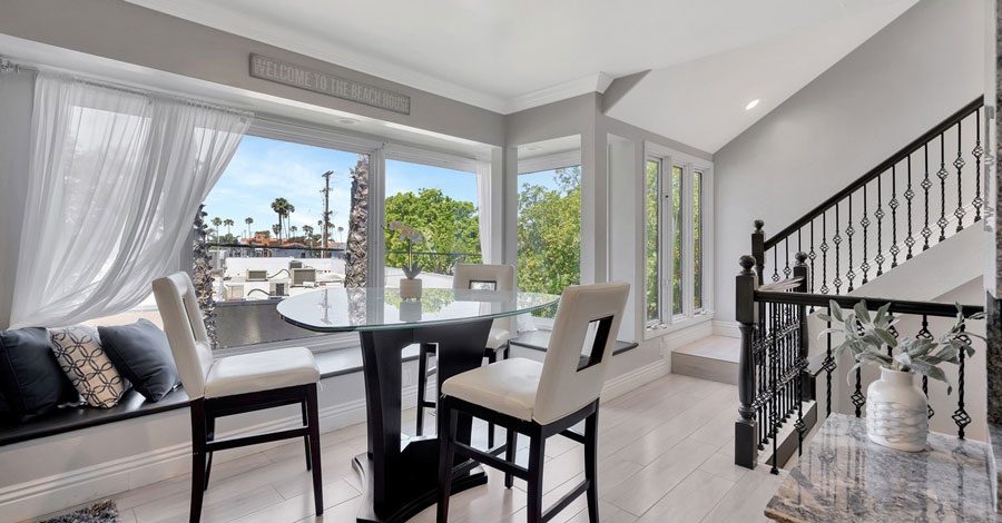 interior of modern condo in newport beach with large windows 