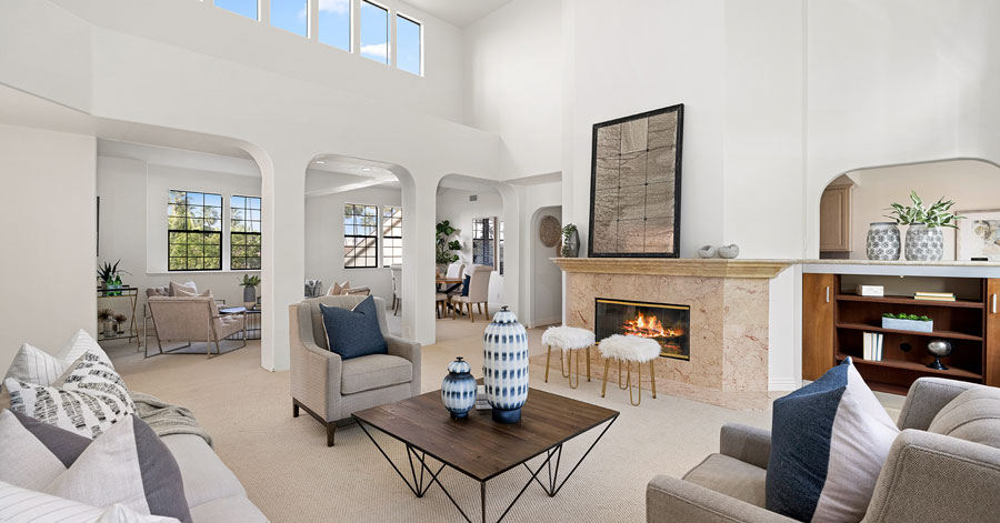 interior of condo with two story ceilings large windows and lots of natural light in newport beach - one of the homes for lease in southern california 