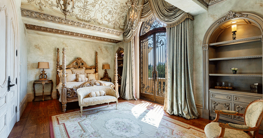 built-in bookshelves in an ornate bedroom 