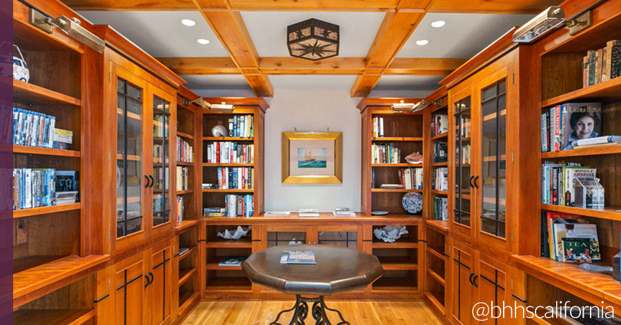 home library with built-in bookshelves 