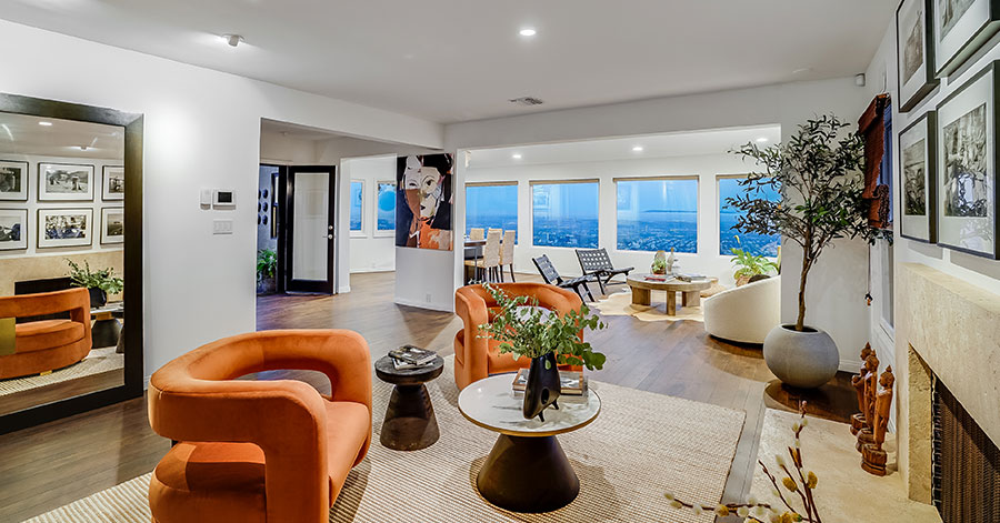 living room with modern furniture and windows overlooking LA 