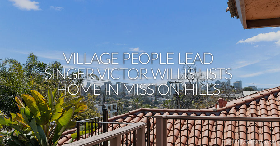 View of downtown San Diego from home's balcony. Text reals "Village People lead singer Victor Willis lists home in Mission Hills." 